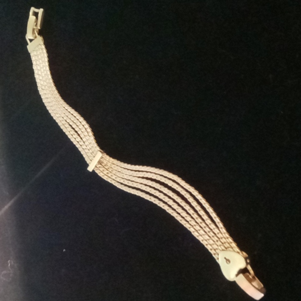 Vintage gold tone multi strand heart bracelet. Like New